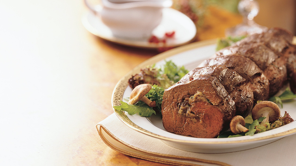 Gorgonzola and Mushroom Stuffed Beef Tenderloin with Merlot Sauce 