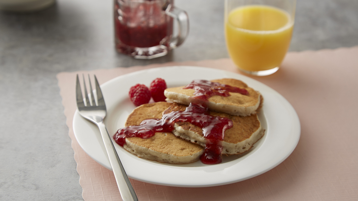 Orange Pancakes with Raspberry Topping